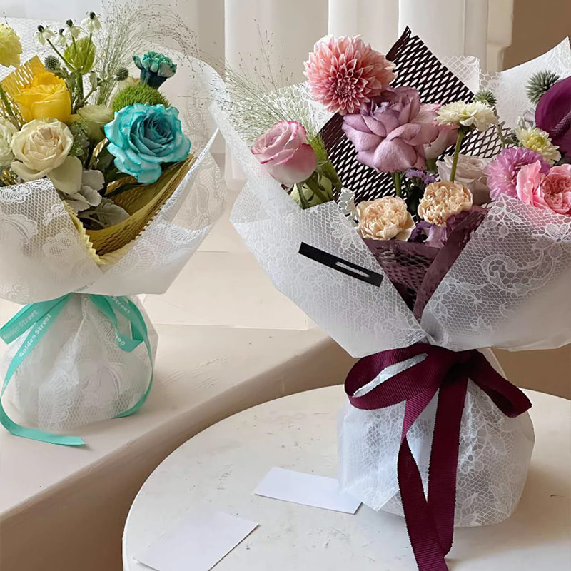 Nuosha blomsterinnpakningspapir i ulike mønstre og stiler